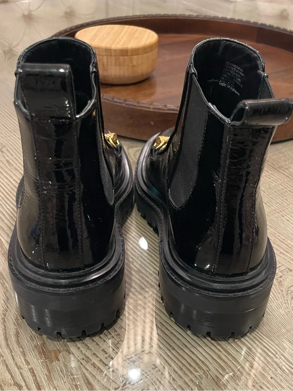 Tory Burch Women’s Black Patent Leather Boots with Gold Accent